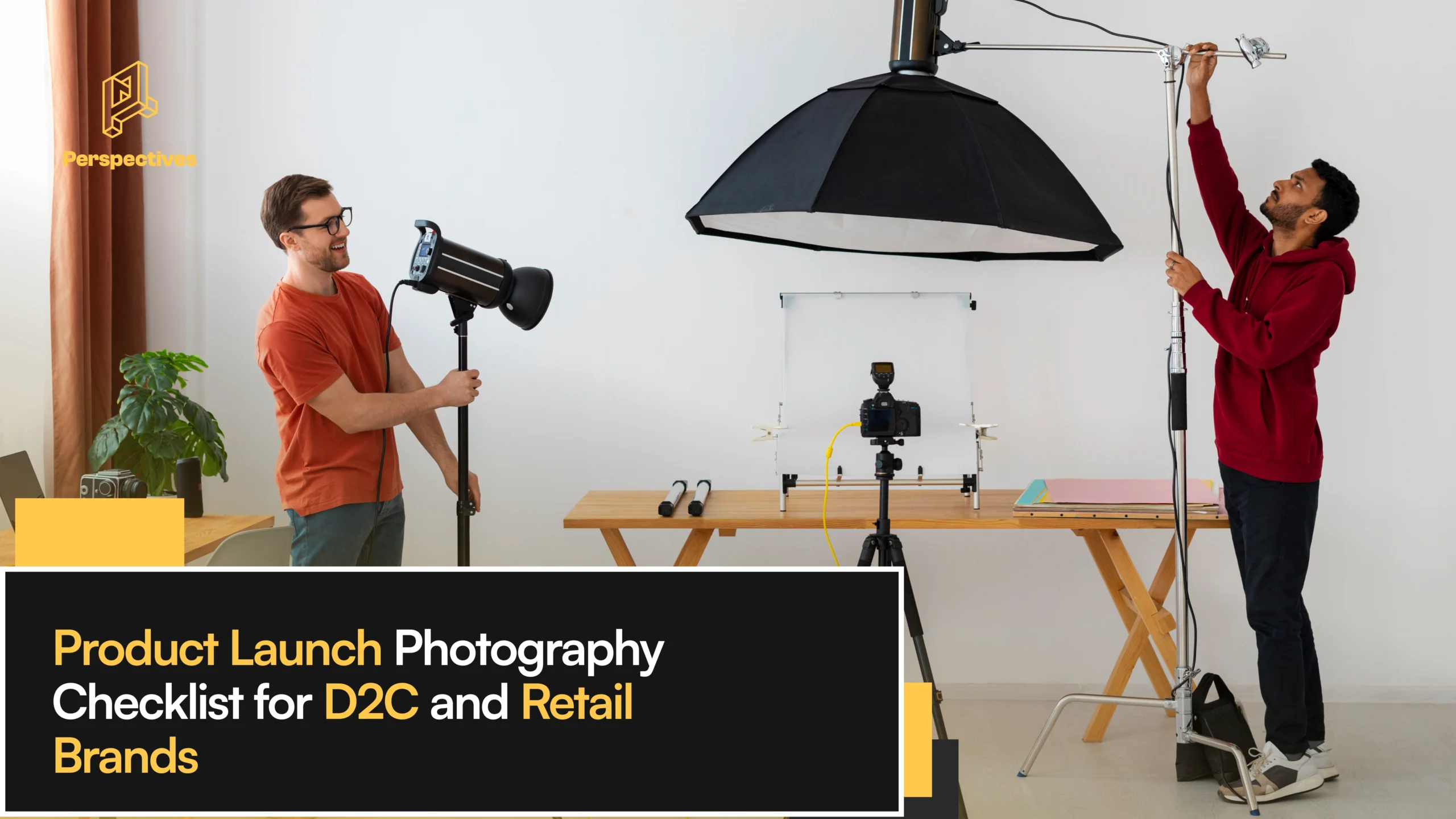 Photographer setting up lighting and camera equipment for a product launch photoshoot